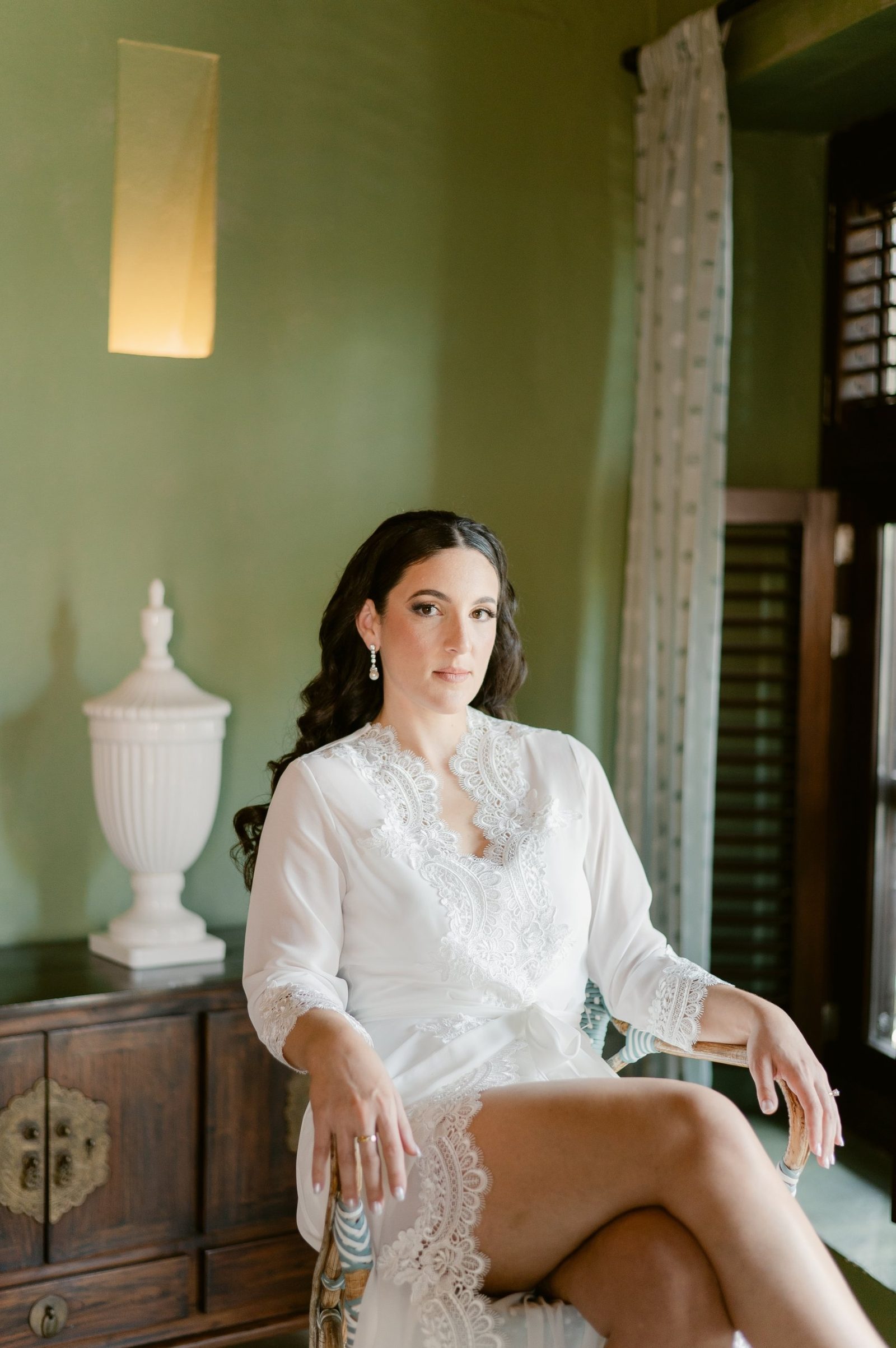 Nicole getting ready in a colonial room, black and white
